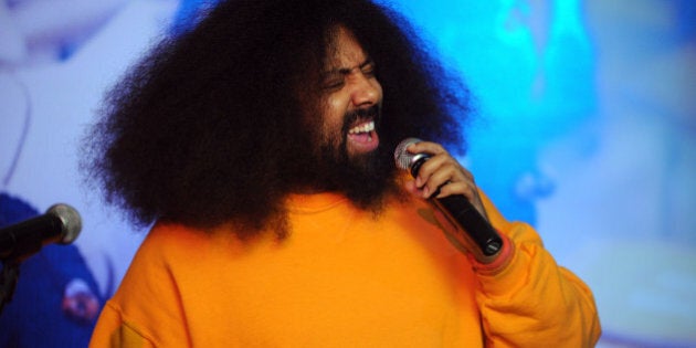 NEW YORK, NY - DECEMBER 10: Comedian and Musician Reggie Watts performs onstage at Artists for Peace and Justice NYC Holiday Benefit presented by Bovet 1822 at Up&Down on December 10, 2013 in New York City. (Photo by Bryan Bedder/Getty Images for Artists for Peace and Justice)