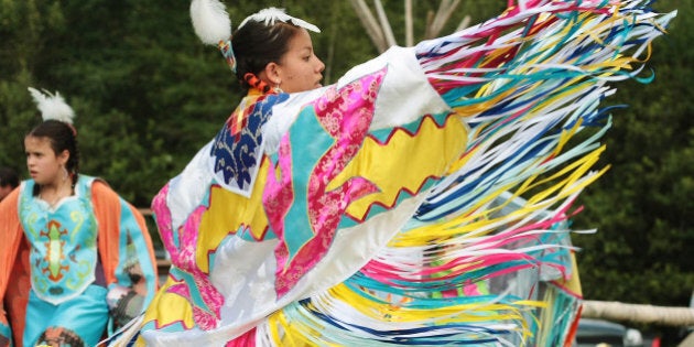 Jennifer Maloney performs a traditional native