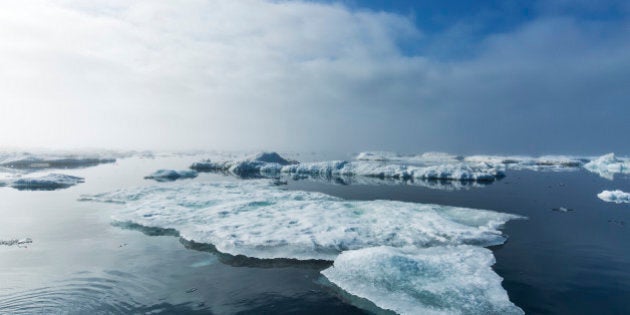 Canada, Nunavut Territory, Summer fog above melting sea ice in Hudson Bay near Arctic Circle