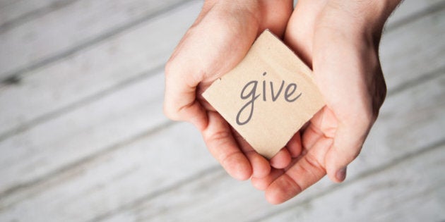 Two hands offering to give, donate or charity