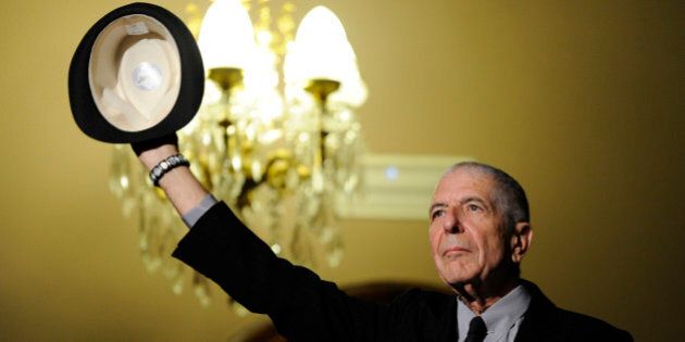 Canadian singer-songwriter Leonard Cohen gestures during a tribute in Gijon, northern Spain, October 19, 2011. Cohen will be awarded the 2011 Prince of Asturias Award for Literature at a traditional ceremony on Friday in the Asturian capital. The Prince of Asturias Awards has been held annually since 1981 to reward scientific, technical, cultural, social and humanitarian work done by individuals, work teams and institutions. REUTERS/Eloy Alonso (SPAIN - Tags: SOCIETY ENTERTAINMENT)