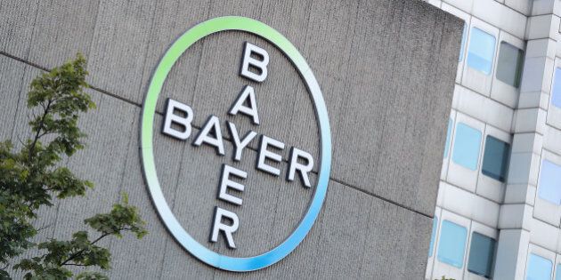 BERLIN, GERMANY - SEPTEMBER 14: The logo of German pharmaceuticals and chemicals giant Bayer stands over Bayer corporate offices on September 14, 2016 in Berlin, Germany. The company confirmed earlier today that it has sealed the deal to buy Monsanto for USD 66 billion. (Photo by Sean Gallup/Getty Images)