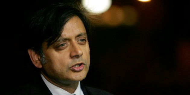 FILE- In this June 19, 2006 file photograph, India's junior foreign minister Shashi Tharoor, then a United Nations undersecretary general for communications and public information, speaks to the media in New Delhi, India. Tharoor has resigned amid allegations of corruption in the bidding for a new team in the lucrative Indian Premier League cricket tournament. The former UN diplomat met with Prime Minister Manmohan Singh and several senior leaders of the ruling Congress party on Sunday, April 18, 2010, before sending in his resignation later that night.(AP Photo/Gurinder Osan, File)
