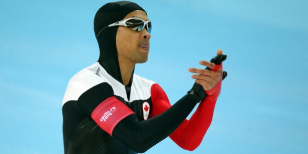 SOCHI, RUSSIA - FEBRUARY 10: Gilmore Junio of Canada reacts after competing during the Men's 500 m Race 2 of 2 Speed Skating event during day 3 of the Sochi 2014 Winter Olympics at Adler Arena Skating Center on February 10, 2014 in Sochi, Russia. (Photo by Quinn Rooney/Getty Images)