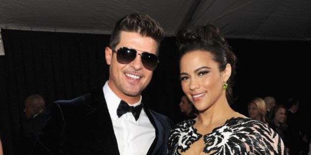 LOS ANGELES, CA - JANUARY 26: Robin Thicke and Paula Patton attend the 56th GRAMMY Awards at Staples Center on January 26, 2014 in Los Angeles, California. (Photo by Kevin Mazur/WireImage)