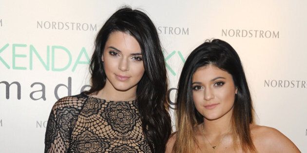 GLENDALE, CA - FEBRUARY 22: Kendall Jenner and Kylie Jenner pose during a photocall for their new MADDEN GIRL collection at Nordstrom at The Americana at Brand on February 22, 2014 in Glendale, California. (Photo by Angela Weiss/Getty Images)