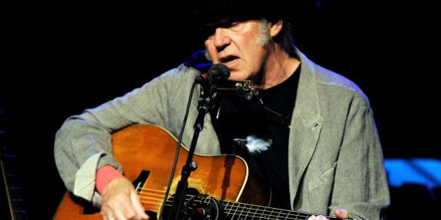 LOS ANGELES, CA - MARCH 29: Singer/songwriter Neil Young performs at the Dolby Theatre on March 29, 2014 in Los Angeles, California. (Photo by Kevin Winter/Getty Images)
