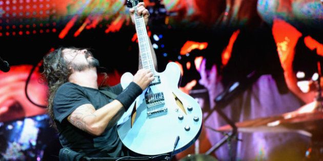 LAS VEGAS, NV - OCTOBER 26: Musician Dave Grohl of Foo Fighters performs onstage during day 3 of the 2014 Life Is Beautiful Festival on October 26, 2014 in Las Vegas, Nevada. (Photo by Jeff Kravitz/FilmMagic)