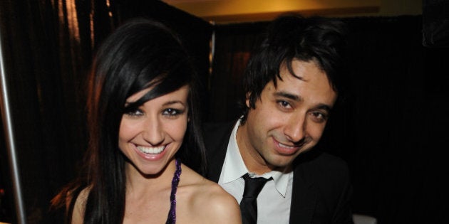 VANCOUVER, BC - MARCH 29: Lights and Jian Ghomeshi pose backstage in the E Talk Lounge at the 2009 Juno Awards at General Motors Place on March 29, 2009 in Vancouver, British Columbia, Canada. (Photo by George Pimentel/WireImage)