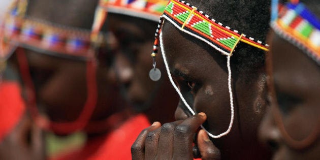 Kenyan teenage Maasai girls attend an alternative right of passage at Kilgoris, Trans Mara district, 220 kilometres north-west of the capital Nairobi, on April 19, 2008 at a ceremony organised by an anti-female genital mutilation, (FGM) campaign, Cherish Others Organisation. The World Health Organisation estimates that between 100 and 132 million girls and women around the world have been subjected to the 'cut' and despite having been outlawed FGM is still regarded as a crucial tradition in some Kenyan communities regardless of its negative physical and psychological health repercussions. AFP PHOTO/TONY KARUMBA (Photo credit should read TONY KARUMBA/AFP/Getty Images)