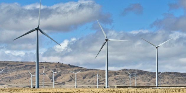 Wind Turbines on a Wind farm produce clean energy. Taken in Wyoming.
