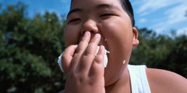 Overweight Boy Eating