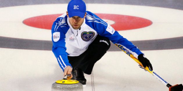 CALGARY, AB - MARCH 1: British Columbia skip Jim Cotter delivers his shot in his game against Northern Ontario during the Tim Horton's Brier at the Scotiabank Saddledome on March 1, 2015 in Calgary, Alberta, Canada. (Photo by Todd Korol/Getty Images)