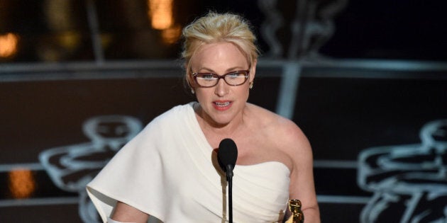 Patricia Arquette accepts the award for best actress in a supporting role for âBoyhoodâ at the Oscars on Sunday, Feb. 22, 2015, at the Dolby Theatre in Los Angeles. (Photo by John Shearer/Invision/AP)