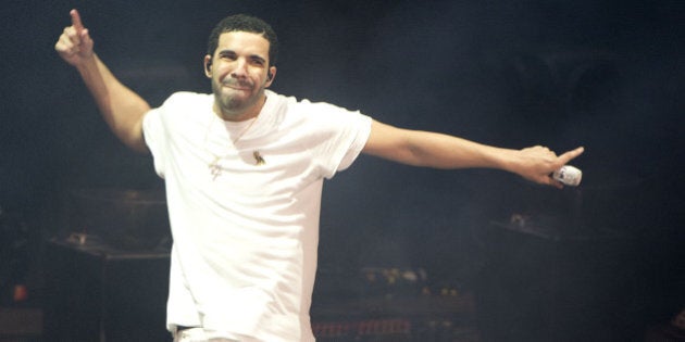 MOUNTAIN VIEW, CA - SEPTEMBER 16: Rapper Drake performs during the Drake vs. Lil Wayne Tour at Shoreline Amphitheatre on September 16, 2014 in Mountain View, California. (Photo by C Flanigan/FilmMagic)