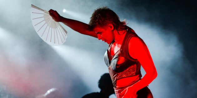 SOUTHWOLD, ENGLAND - JULY 19: Robyn performs with Royksopp on stage at Latitude Festival 2014 at Henham Park Estate on July 19, 2014 in Southwold, United Kingdom. (Photo by Andy Sheppard/Redferns via Getty Images)