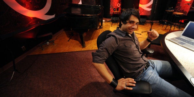 TORONTO, ON - MAY 6: Jian Ghomeshi, host of CBC-Radio morning show, Q, in the Q studio at CBC. (Rick Eglinton/Toronto Star via Getty Images)