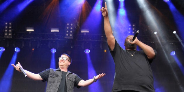 El-P and Killer Mike with Run the Jewels performing as part of the CounterPoint Music Festival on Sunday, Apr. 27, 2014, in Kingston Downs, GA. (Photo by Robb D. Cohen/Invision/AP)