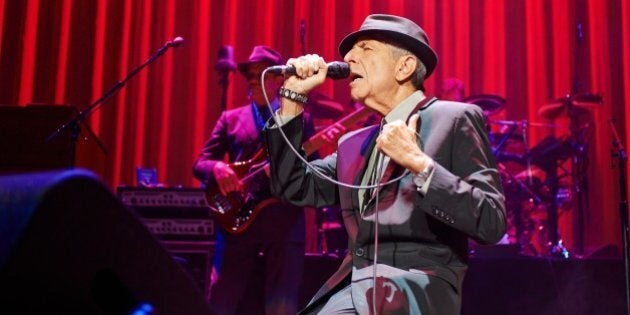 LEEDS, UNITED KINGDOM - SEPTEMBER 07: Leonard Cohen performs on stage at Leeds Arena on September 7, 2013 in Leeds, England. (Photo by Gary Wolstenholme/Redferns via Getty Images)