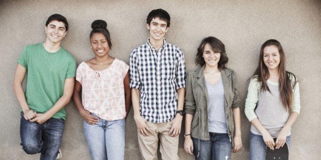 Teenagers smiling together outdoors