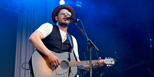 Adrian Sutherland, frontman for Midnight Shine, performs on the City Stage at 2017 Ottawa Bluesfest.