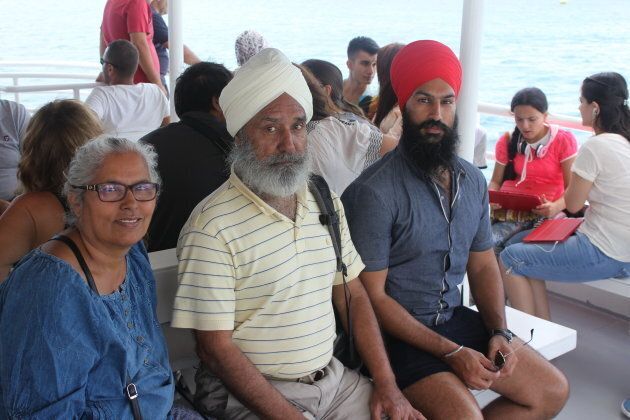 Singh poses with his parents, who immigrated from Punjab to Canada.