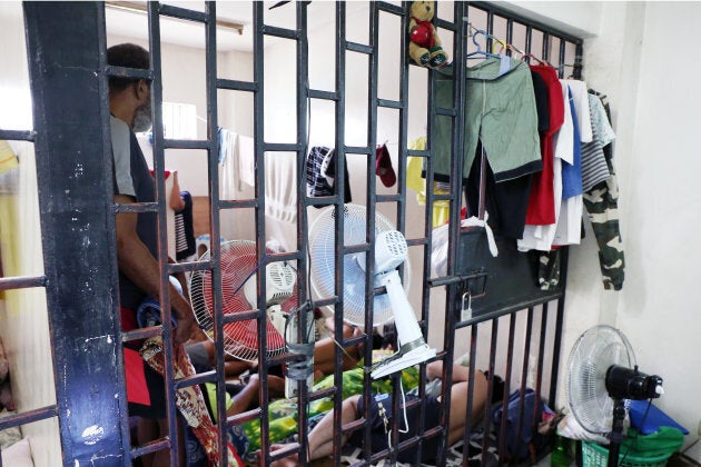 Suspects in cases involving violence against women and children are held in this cell at Philippine National Police headquarters in Manila before their court hearings.