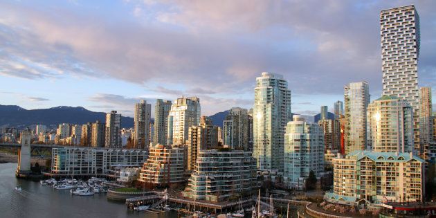 Condo towers along the shore of False Creek in Vancouver. You need to be among the top 25 per cent of earners to afford a benchmark condo in Vancouver or Toronto, according to Zoocasa.