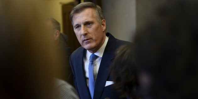 Maxime Bernier, leader of the People's Party of Canada, speaks to reporters in the House of Commons on Parliament Hill in Ottawa on March 19, 2019.