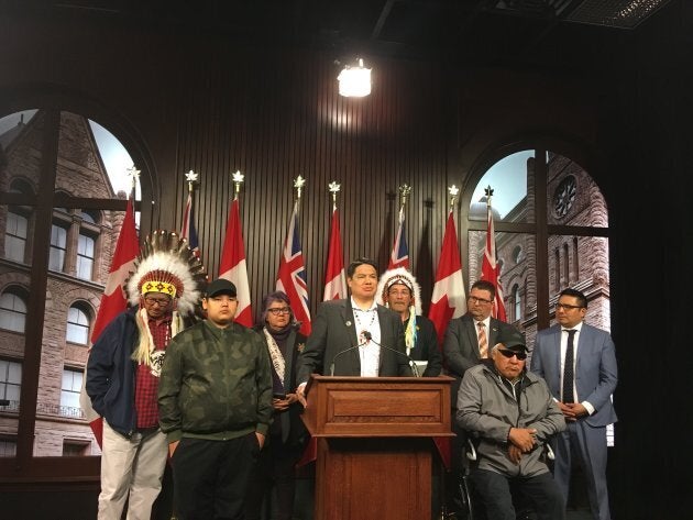 Derek Fox, deputy grand chief of Nishnawbe Aski Nation, speaks at Queen's Park on April 29, 2019, surrounded by community leaders, MPPs and members of Kashechewan First Nation.