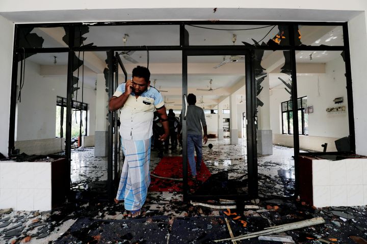 A Muslim man reacts inside the Abbraar Masjid mosque after a mob attack in Kiniyama, Sri Lanka May 13, 2019. 