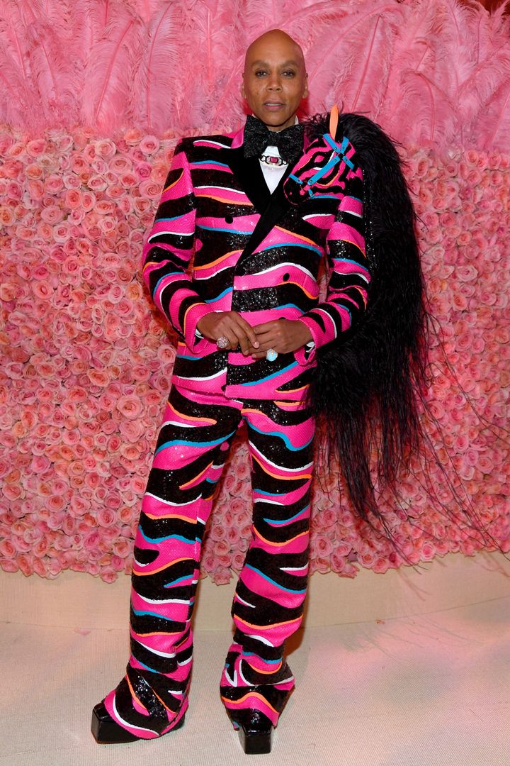 RuPaul attended the 2019 Met Gala in a pink and black sequined suit, designed by Zaldy.