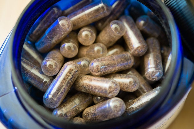 A midwife prepares a placenta for encapsulation in her Washington, D.C. home on July 25, 2014.