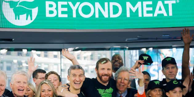 Ethan Brown, center, CEO of Beyond Meat, attends an Opening Bell ceremony with guests to celebrate the company's debut on the Nasdaq, Thurs. May 2, in New York.