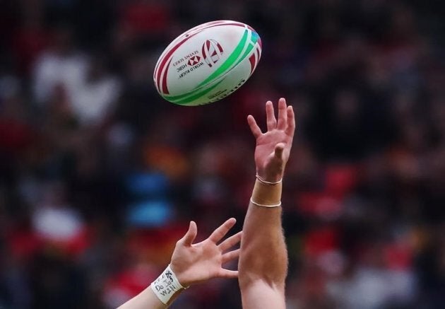 File photo of a player catching a rugby ball.