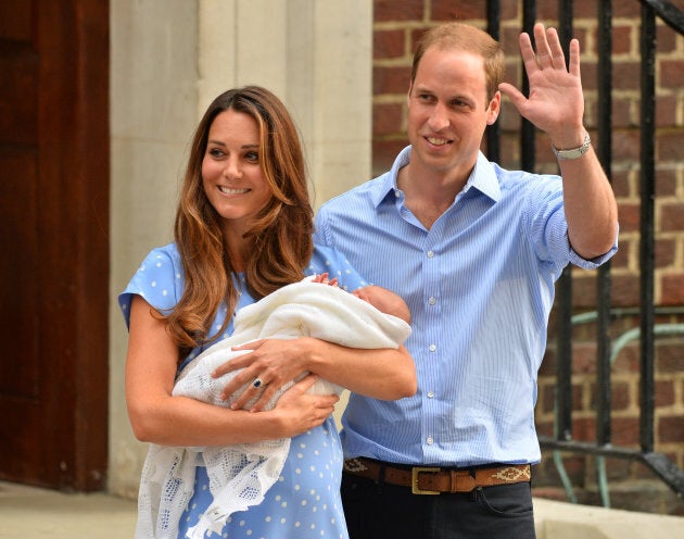 Prince William and Catherine, Duchess of Cambridge show their new-born baby boy to the world's media, standing on the steps outside the Lindo Wing of St Mary's Hospital in London on July 23, 2013.