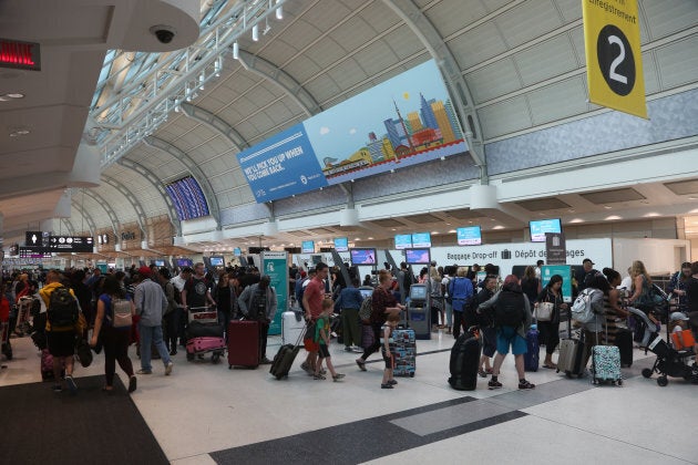 Travellers at Toronto's Lester B. Pearson International Airport.