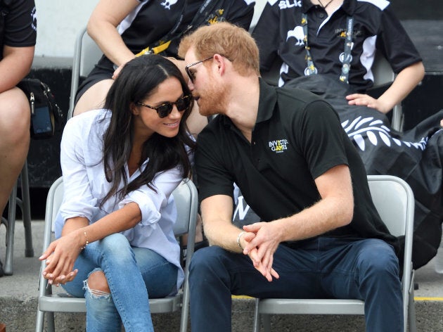 Meghan Markle and Prince Harry, probably whispering "no, I love YOU more!" back and forth to each other on day three of the Invictus Games Toronto 2017 at Nathan Philips Square on Sept. 25, 2017 in Toronto.