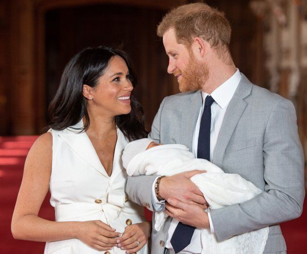 The Duke and Duchess of Sussex pose with baby Archie on Wednesday.
