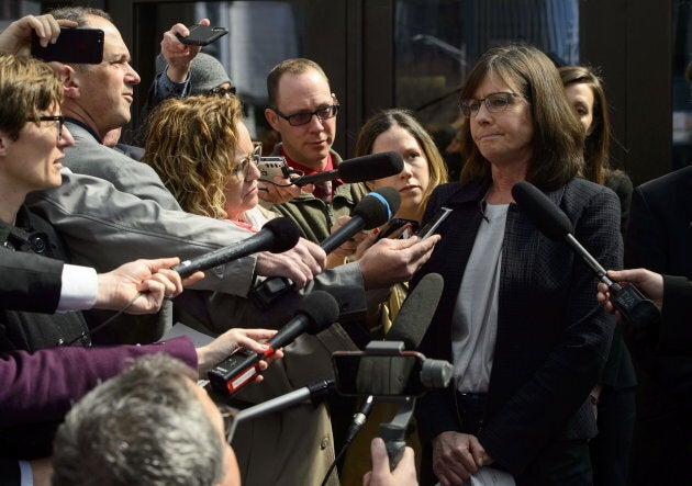 Crown Prosecutor Barbara Mercier talks to reporters as she leaves court in Ottawa following a decision on Vice-Admiral Mark Norman on May 8, 2019.