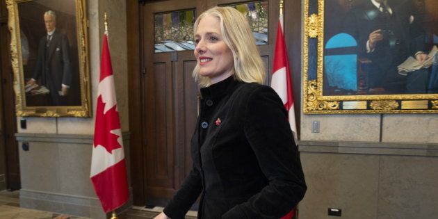 Environment Minister Catherine McKenna speaks in the foyer of the House of Commons on May 3, 2019.
