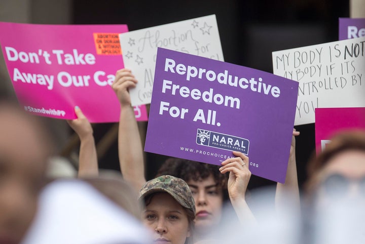 Protesters rally outside of the Georgia State Capitol following the signing of Georgia's bill restricting abortions on May 7, 2019. 