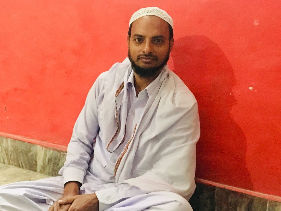Iqbal Ahmed is a 26-year-old weaver in Varanasi. 