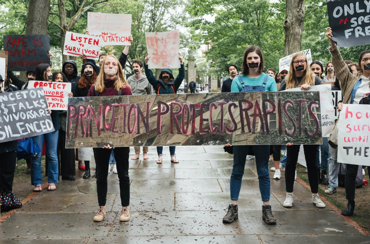 Student organizers staging a silent sit-in in front of Nassau Hall. 