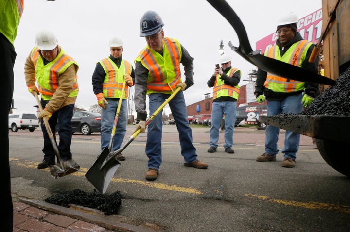 Republican Rick Snyder, Whitmer's predecessor as governor, joined a pothole repair crew one day in 2015 to help promote a sal