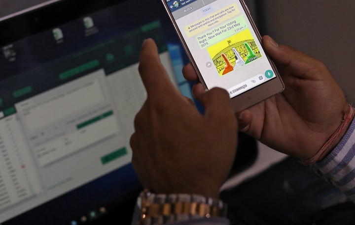 Rohitash Repswal, a digital marketer, checks a WhatsApp message that he sent using a software tool that appears to automate the process of sending messages to WhatsApp users, inside his office in New Delhi, India, May 8, 2019. 