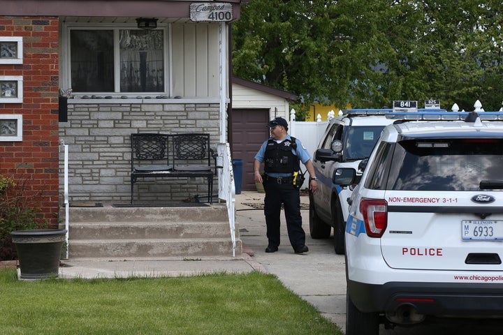 Chicago police watch over a home on Wednesday, May 15, 2019, where the body of Marlen Ochoa-Uriostegui, 19, was found.