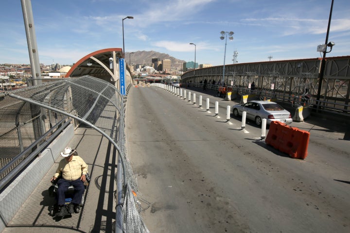 A man crosses from El Paso, Texas, into Mexico at Paso del Norte international border crossing bridge on April 9, 2019. The t