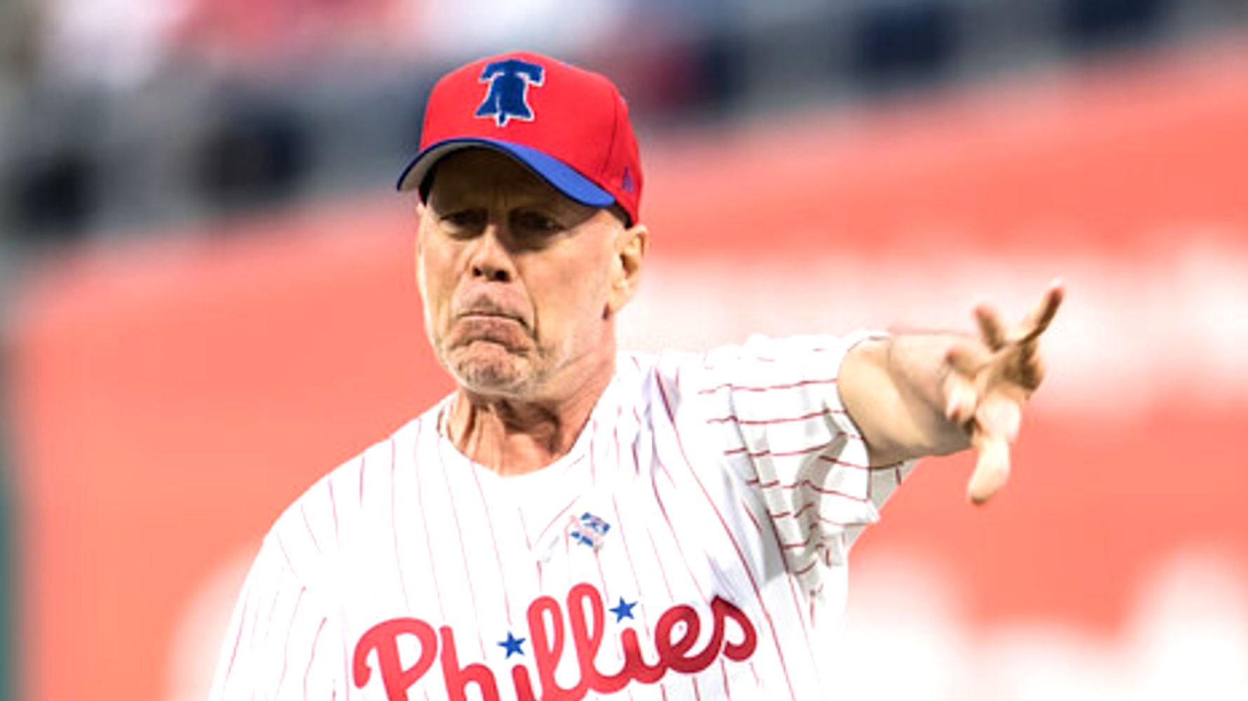 Actor Bruce Willis throws out first pitch, hits batting practice before  Phillies game