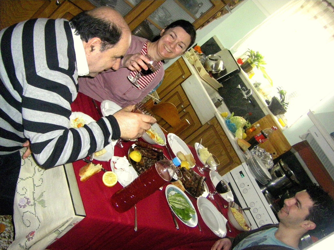 Zak Kostopoulos with his parents in Athens, Greece